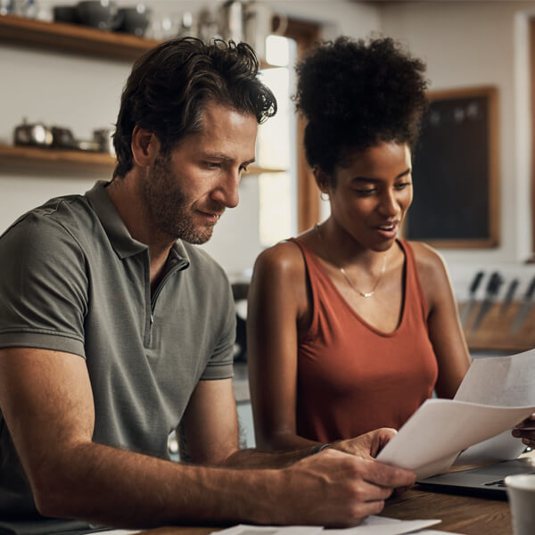 couple reviewing paperwork